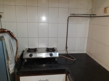 Kitchen in 1 BHK Apartment at Amritvan Complex, Aarey Colony – for Rent
