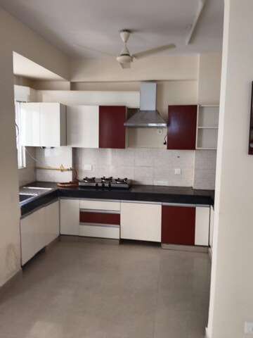Kitchen in 4 BHK Apartment at Aditya Urban Casa, Sector 78 – for Rent