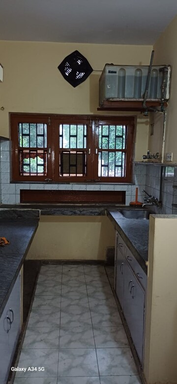 Kitchen in 3 BHK Apartment at Adani Oyster Greens, Sector 102 – for Rent