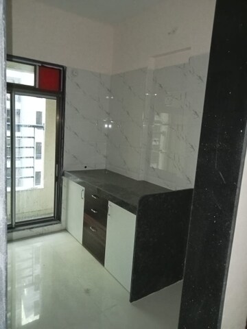 Kitchen in 1.5 BHK Apartment at Shree Shakun Greens, Virar West – for Rent