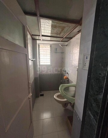Bathroom in 2 BHK Apartment at Ankur CHS Andheri West, Andheri West – for Rent