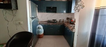 Kitchen in 3 BHK Apartment at Mahagun Mywoods, Sector 16c Greater Noida – for Rent