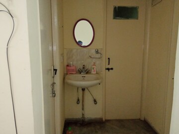 Bathroom in 2 BHK Apartment at Naiknavare Trinity Court, Koregaon Park – for Rent