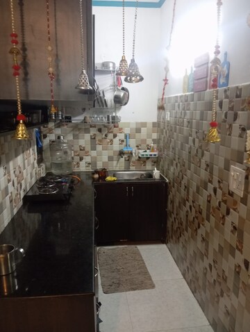 Kitchen in 2.5 BHK Apartment at Lotus Panache, Sector 110 – for Sale