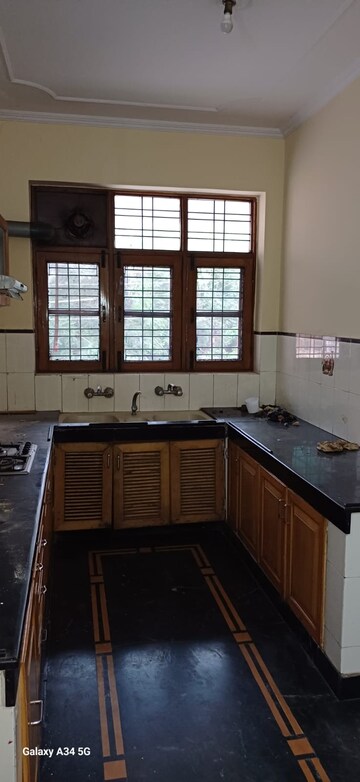 Kitchen in 3 BHK Apartment at Adani Oyster Greens, Sector 102 – for Rent