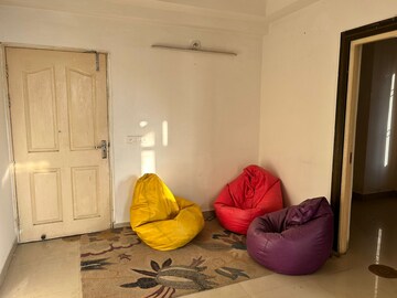 Living Room in 1 BHK Apartment at Spring Meadows, Tech Zone 4 Greater Noida – for Rent