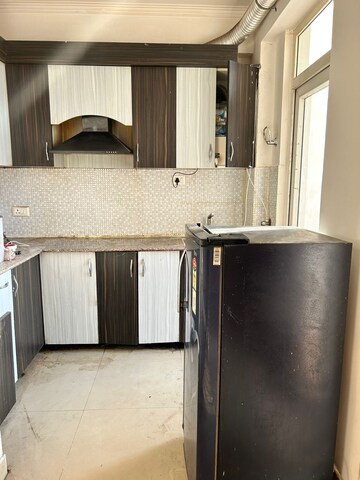 Kitchen in 1 BHK Apartment at Spring Meadows, Tech Zone 4 Greater Noida – for Rent