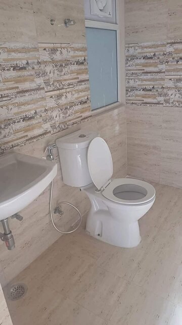 Bathroom in 2 BHK Apartment at Amrapali Golf Homes, Sector 4, Greater Noida – for Sale