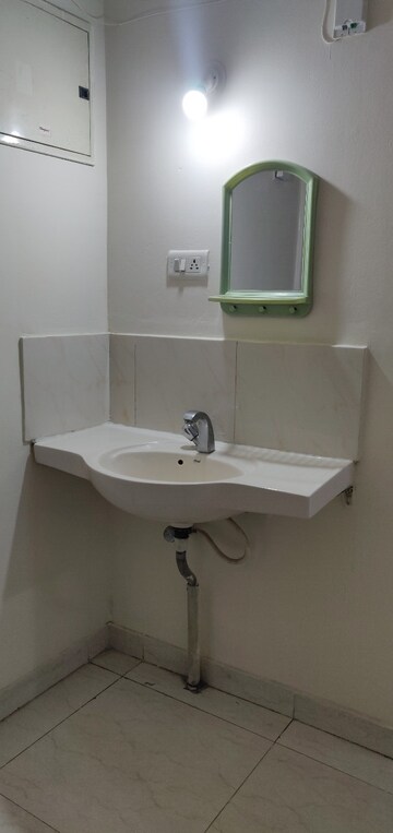 Bathroom in 2 BHK Apartment at Magarpatta City Cosmos, Magarpatta Road – for Rent