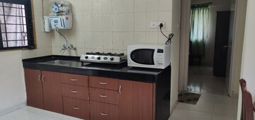 Kitchen in 2 BHK Apartment at Magarpatta City Cosmos, Magarpatta Road – for Rent