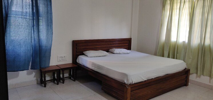 Master Bedroom, magarpatta-city-cosmos 2 Bedroom 1080 Sq.Ft. Apartment In Magarpatta Road Pune 7946033