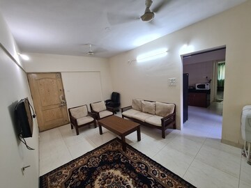 Living Room in 2 BHK Apartment at Magarpatta City Cosmos, Magarpatta Road – for Rent