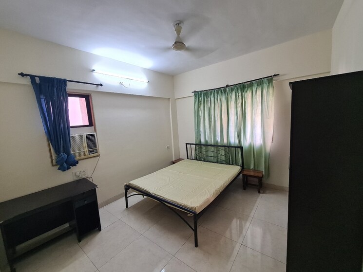 Bedroom, magarpatta-city-cosmos 2 Bedroom 1080 Sq.Ft. Apartment In Magarpatta Road Pune 7946033