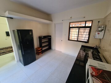 Kitchen in 2 BHK Apartment at Magarpatta City Cosmos, Magarpatta Road – for Rent