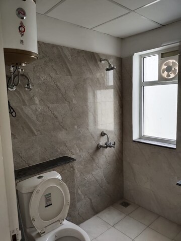 Bathroom in 3 BHK Apartment at International Airport Road – for Rent