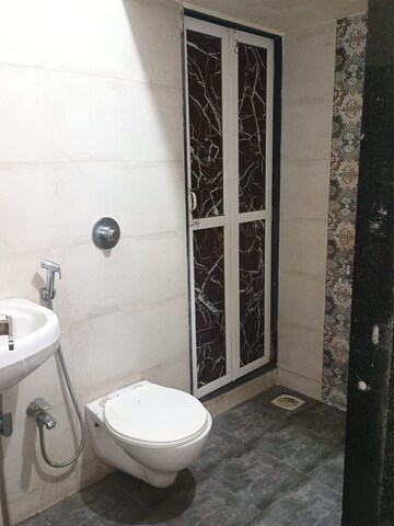 Bathroom in 2 BHK Apartment at Pragati CHS Kalwa, Kalwa – for Sale