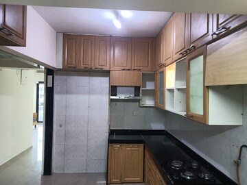 Kitchen in 2.5 BHK Apartment at Sawan Highness, Kharghar – for Rent
