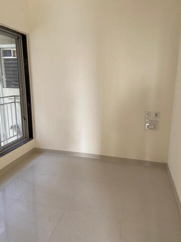Room in 1 BHK Apartment at Dharti Pressidio, Kandivali West – for Sale