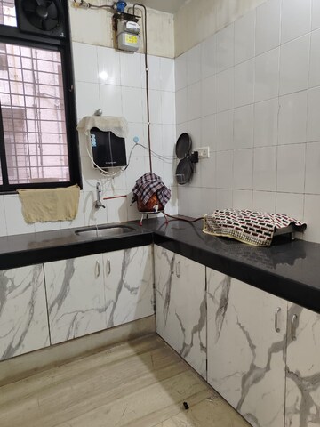 Kitchen in 2.5 BHK Apartment at Swarna CHS, Kharghar Sector 7 – for Rent