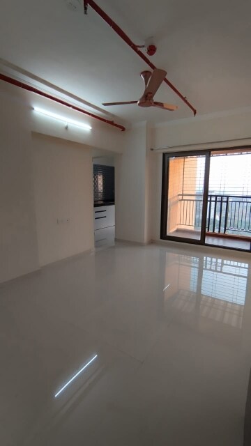 Room in 2 BHK Apartment at Raunak City Sector 4 D8, Kalyan West – for Rent