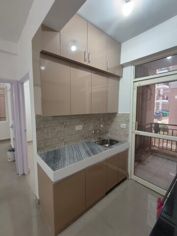 Kitchen in 2 BHK Apartment at Suncity Avenue 76, Sector 76 – for Rent