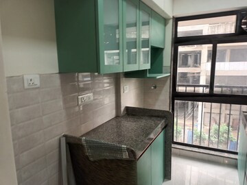 Kitchen in 1 BHK Apartment at Parinee Essence, Kandivali West – for Sale