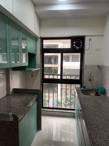 Kitchen in 1 BHK Apartment at Parinee Essence, Kandivali West – for Sale