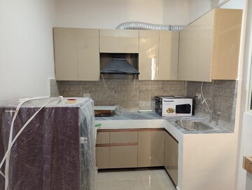 Kitchen in 2 BHK Apartment at Suncity Avenue 76, Sector 76 – for Rent
