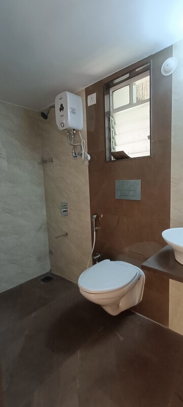 Master Bedroom in 1 BHK Apartment at Sunteck Maxxworld, Naigaon East – for Rent