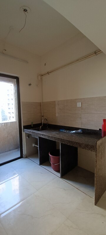 Kitchen in 2 BHK Apartment at Sunteck Maxxworld 4, Naigaon East – for Rent