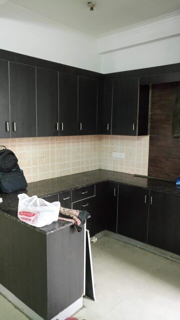 Kitchen in 3 BHK Apartment at SVP Gulmohur Garden, Raj Nagar Extension – for Rent