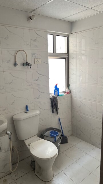 Bathroom in 3 BHK Apartment at SVP Gulmohur Garden, Raj Nagar Extension – for Rent