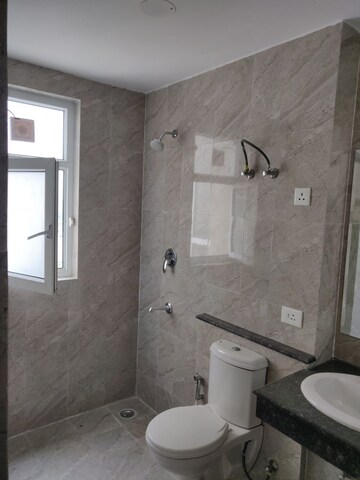 Bathroom in 3 BHK Apartment at Adani M2K Oyster Grande, Sector 102 – for Rent