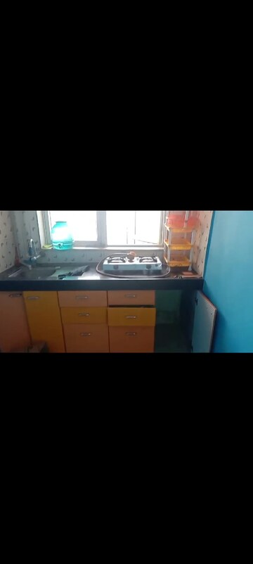 Kitchen in 1 BHK Apartment at Royal Palms, Goregaon East – for Rent