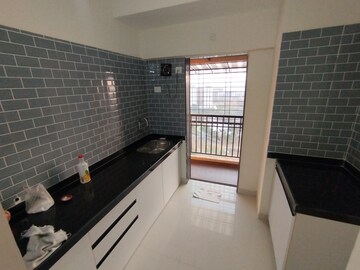 Kitchen in 2 BHK Apartment at Murbad Road – for Rent