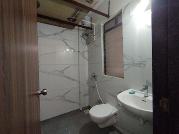 Bathroom in 2 BHK Apartment at Murbad Road – for Rent