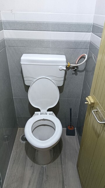 Bathroom in 1 RK Apartment at Seawoods Sector 48 – for Rent