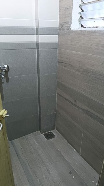 Bathroom in 1 RK Apartment at Seawoods Sector 48 – for Rent