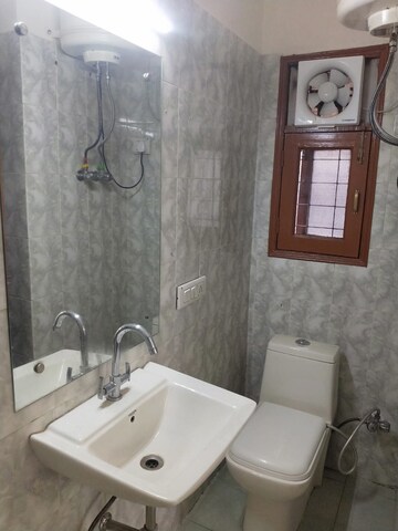 Bathroom in 2 BHK Apartment at Amrapali Princely Estate, Sector 76 – for Rent