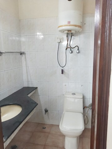 Bathroom in 2 BHK Apartment at Amrapali Princely Estate, Sector 76 – for Rent