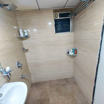 Bathroom in 4 BHK Apartment at Vesu – for Sale