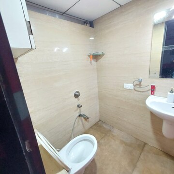 Bathroom in 4 BHK Apartment at Vesu – for Sale