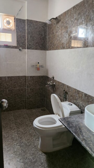 Bathroom in 3 BHK Apartment at RJ Garden, Indiranagar – for Rent