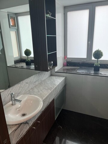 Bathroom in 2.5 BHK Apartment at DB Orchid Woods, Goregaon East – for Rent