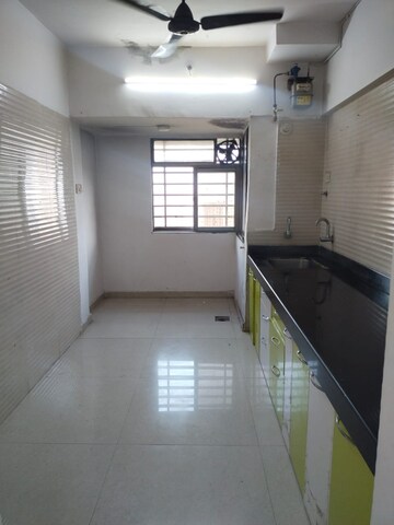 Kitchen in 1 BHK Apartment at Lodha Amara, Kolshet Road – for Sale