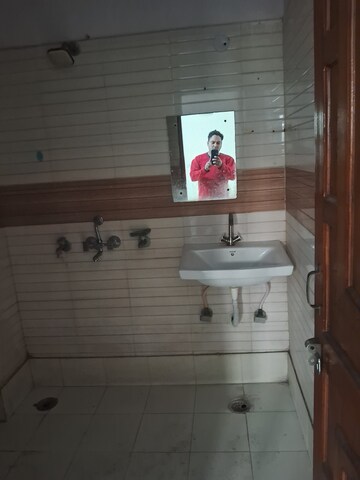 Bathroom in 2.5 BHK Builder Floor at Anand Nagar – for Rent