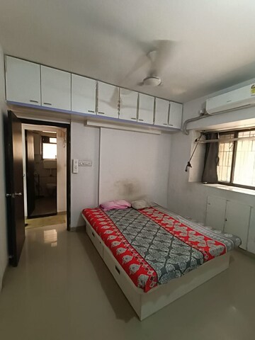 Bedroom in 1.5 BHK Apartment at Runwal Garden City, Balkum Pada – for Rent