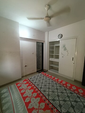 Bedroom in 1.5 BHK Apartment at Runwal Garden City, Balkum Pada – for Rent