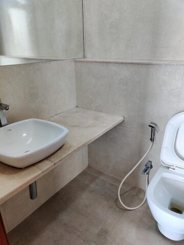Bathroom in 3 BHK Apartment at Omkar Alta Monte, Malad East – for Rent