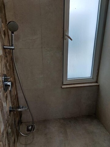 Bathroom in 3 BHK Apartment at Omkar Alta Monte, Malad East – for Rent